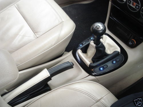 FITS ASTRA G Mk4 COUPE/4 DOORS LEATHER CREAM & BLACK GAITERS CUSTOM NEW